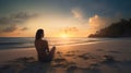 A relaxed young brunette woman or girl wearing a bikini sitting on a deserted tropical beach at sunset or sunrise