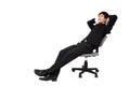 Relaxed young businessman sitting on the chair Royalty Free Stock Photo