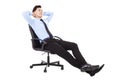 Relaxed Young businessman sitting in a chair isolated Royalty Free Stock Photo