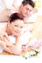 Relaxed young couple receiving a back massage Royalty Free Stock Photo