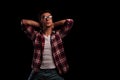 Relaxed young man wearing glasses looks up Royalty Free Stock Photo