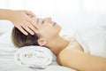 Relaxed Young woman enjoy massage in spa salon Royalty Free Stock Photo