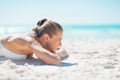 Relaxed young woman laying on beach Royalty Free Stock Photo