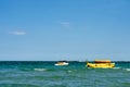 Floating  yellow  banana   boat ride  near seashoire  ready to be used for Royalty Free Stock Photo