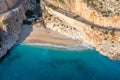 Relaxing aerial beach, summer vacation tropical Mediterranean landscape. Peaceful beach, seaside surf. Waves surf amazing blue Royalty Free Stock Photo