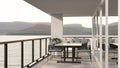 Relaxing area or restaurant seating space at the balcony with mountain and lake view