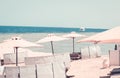 Relaxing Beach background with umbrellas and sea Royalty Free Stock Photo