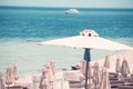 Relaxing Beach background with umbrellas and sea Royalty Free Stock Photo