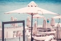 Relaxing Beach background with umbrellas and sea Royalty Free Stock Photo