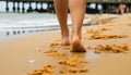 Relaxing beach travel woman walking on sandy beach, enjoying the peaceful serenity up close