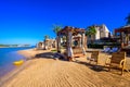 Relaxing at beach at white beach - travel destination for vacation - Hurghada, Red Sea, Egypt Royalty Free Stock Photo