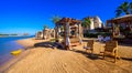 Relaxing at beach at white beach - travel destination for vacation - Hurghada, Red Sea, Egypt Royalty Free Stock Photo