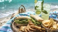 A relaxing beachfront picnic with crisp cucumber sandwiches crunchy chips and refreshing cucumber mint lemonade Royalty Free Stock Photo
