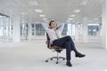 Relaxing Businessman On Chair In New Office Royalty Free Stock Photo