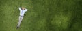 Relaxing businessman on grass Royalty Free Stock Photo