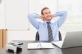Relaxing businessman at his desk Royalty Free Stock Photo
