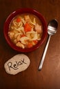 Relaxing and chicken noodle soup Royalty Free Stock Photo