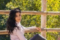 Lovely young girl enjoying a relaxing day in nature while relaxing in a summer and autumn landscape. Relaxing concept, nature Royalty Free Stock Photo