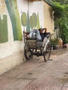 Relaxing in a cyclo, rest between transportation jobs