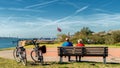 Relaxing elderly couple on their bike trip to Hook of Holland