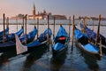 Relaxing evening in gondolas harbor, Venice Royalty Free Stock Photo
