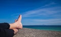 Relaxing feet on the top of Dragor fort Denmark Royalty Free Stock Photo