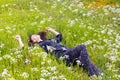 Woman relaxing flower field Royalty Free Stock Photo