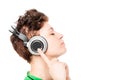 Relaxing girl in headphones enjoying pleasant music