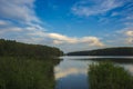 relaxing lake at sunset  Colorful sunset observed over lake on calm summer evening. Reflection of sky on lake made a dramatic Royalty Free Stock Photo