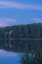 relaxing lake at sunset  Colorful sunset observed over lake on calm summer evening. Reflection of sky on lake made a dramatic Royalty Free Stock Photo