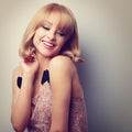 Relaxing laughing young fashion blond woman with short hair styl Royalty Free Stock Photo