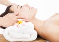 Relaxing massage of face for asian woman