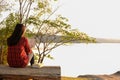 Relaxing moments, Young woman reading a book in nature background. Solo relaxation, color of Hipster Tone. Royalty Free Stock Photo