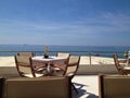 Table and chairs with sea view