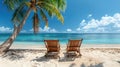 Relaxing in Paradise: Tropical Beach Chairs and Palm Trees on Coral Sand with Blue Ocean - Perfect for Summer Vacation! Royalty Free Stock Photo