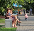 Relaxing on a park bench