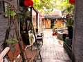 Relaxing and peaceful Chinese courtyard. Hanging red lanterns, plants and