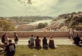 Relaxing people on hill over river Douro, with friends and nice view cityscape Royalty Free Stock Photo