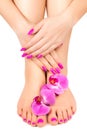 Pink manicure and pedicure with a orchid flower