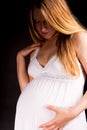 Relaxing pregnant blonde woman Royalty Free Stock Photo