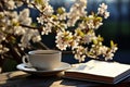 Relaxing and rejuvenating spring ambiance with a white coffee cup and a book on a table