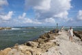 Relaxing on the seawall at South Inlet Park Boca Raton Florida