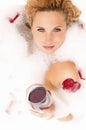 Relaxing Sensual Caucasian Blond Female in Foamy Bathtub.