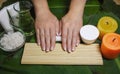 Relaxing spa for hands. Natural cosmetics, creams, oils and scrubs. Royalty Free Stock Photo