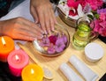 Relaxing spa for hands. Natural cosmetics, creams, oils and scrubs. Royalty Free Stock Photo