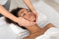 Relaxing spa massage for african american lady Royalty Free Stock Photo
