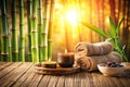 Spa Setting in Brown Tone on Sunlighted Bamboo Background Royalty Free Stock Photo