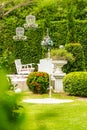 Relaxing space in cozy garden. Royalty Free Stock Photo