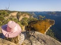 Relaxing with stunning cliff top views mountains and valleys Royalty Free Stock Photo