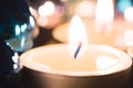Relaxing Tealight With A Bokeh Of Several Candles Royalty Free Stock Photo